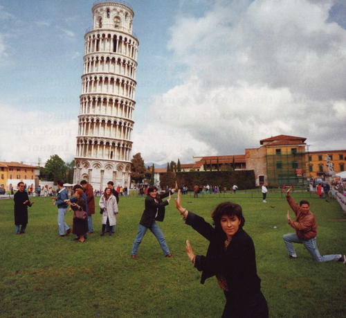 Tourists, don't make it hard to love you!  The Leaning Tower of Pisa honestly is filled with people "holding it up."  Facepalm.